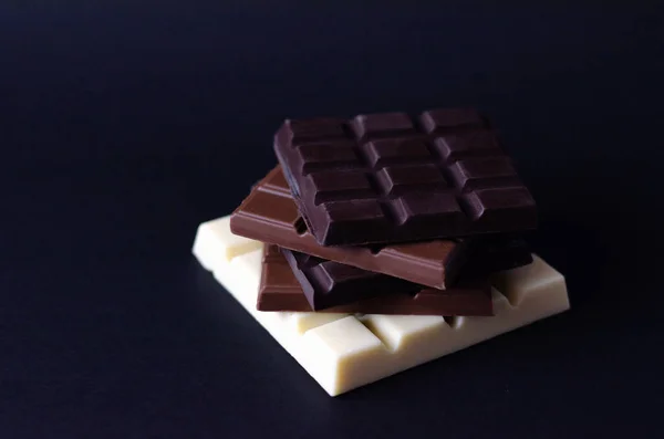 Stack Different Chocolate Black Background Namely Milk Chocolate Black White — Stock Photo, Image