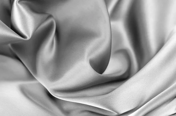 Фон из атласной ткани серого цвета . — стоковое фото