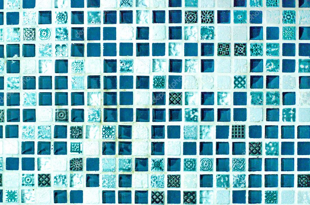 Beautiful background from a small tile mosaic of blue color.