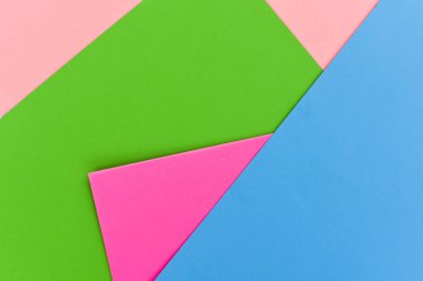 Çeşitli renklerin parlak kağıt arka planı.