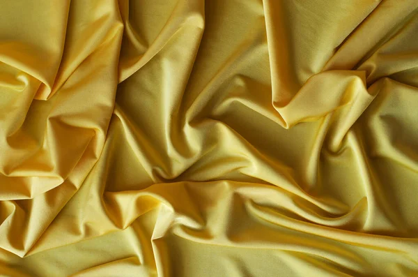 Sfondo da tessuto di raso di colore giallo . — Foto Stock