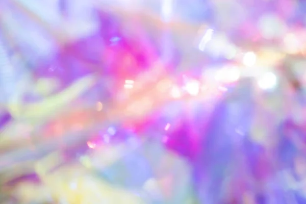 Bright and beautiful blurred abstract holographic background.