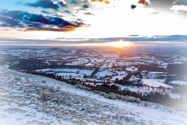 Cotswolds blanketed in British Winter Snow, with white borders