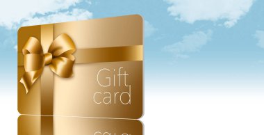 Altın hediye kartı şerit ve altın yayla üzerinde arka izole burada resimde. Bu bir örnektir.