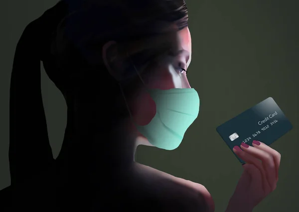 A young woman looks at her credit card as she wears a mask for protection from Coronavirus. This image illustrates how card companies are offering perks to help clients deal with medical and other pandemic related expenses.