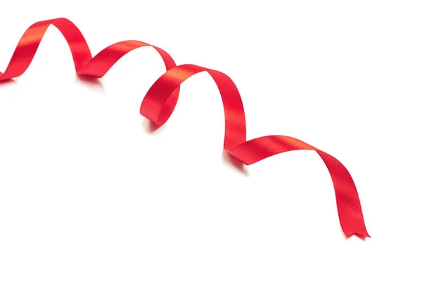 Wavy red ribbon isolated on white background. — Stock Photo, Image