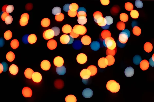 Abstrakta multicolor bokeh textur på svart bakgrund. — Stockfoto