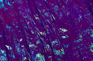 Holografik soyut neon dokulu arkaplan.