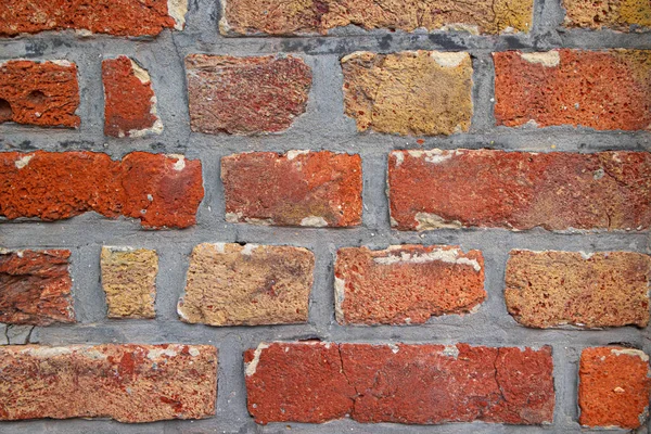 Parede de tijolo de cor vermelha, close-up de alvenaria — Fotografia de Stock