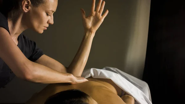 Master girl makes massage on secret technique — Stock Photo, Image