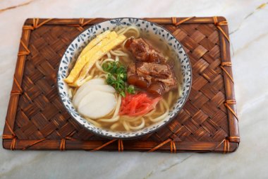 Okinawa Soba Noodles Served with Spareribs. clipart