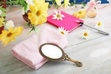 Stylish hand mirror and towel. clipart