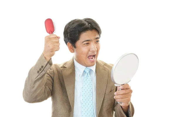 Asian Man Brushing His Hair — Stock Photo, Image