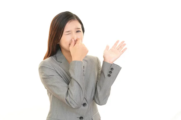 Woman Pinches Her Nose — Stock Photo, Image