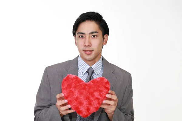Sorrindo Homem Segurando Vermelho Coração Amor Símbolo — Fotografia de Stock