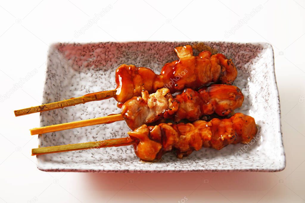 Japanese style grilled chicken on the plate.