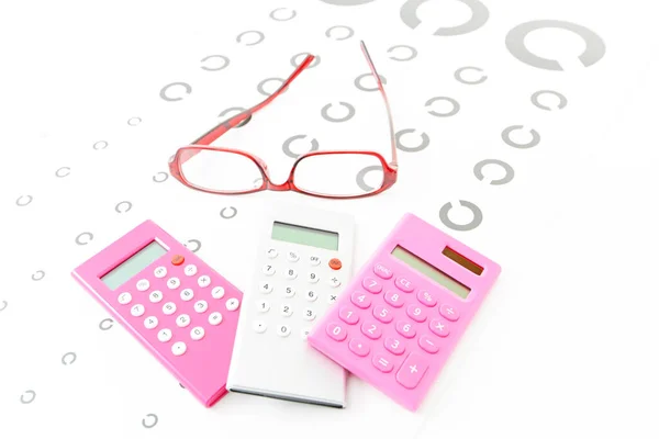 Glasses and calculators on the test card.