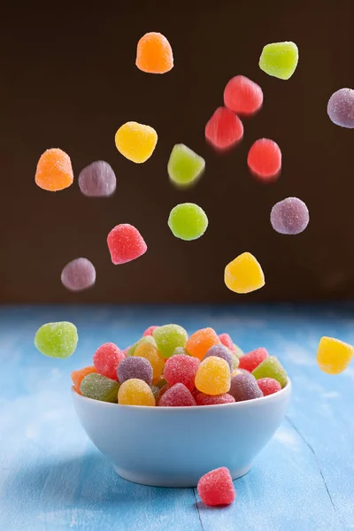 Flying colorful jelly sweet, fruit flavor