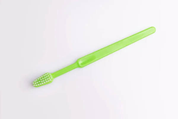 Groene Tandenborstel Geïsoleerd Een Witte Achtergrond — Stockfoto