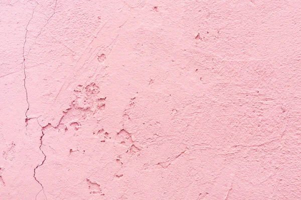 Textura rachada de parede de estuque rosa, close-up Fundo abstrato . — Fotografia de Stock