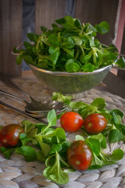 Corn Salad Colander Tomatoes Lie Wooden Box — Stock Photo, Image