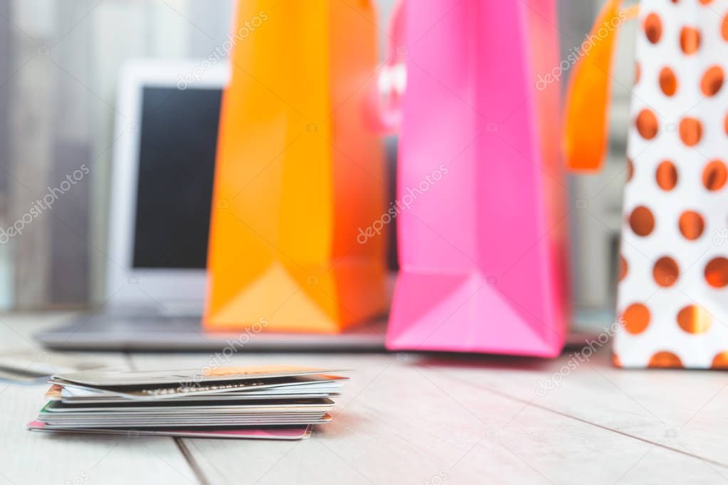 Shopping bags, credit card, laptop