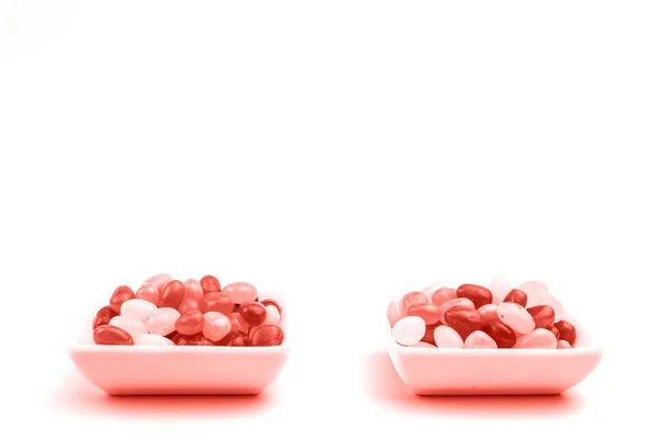 Jelly beans in living coral color concept of the year — Stock Photo, Image