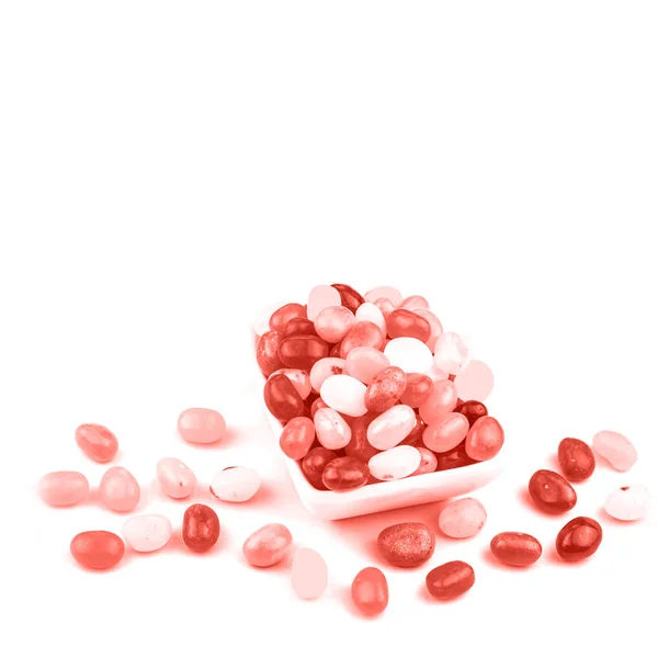 Jelly beans in living coral color concept of the year — Stock Photo, Image