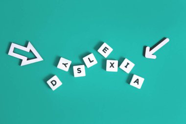 Nane arka plan üzerinde Disleksi kelime ve oklar