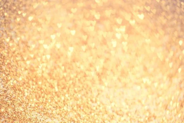 Hearts bokeh arka plan ile altın şenlikli Glitter
