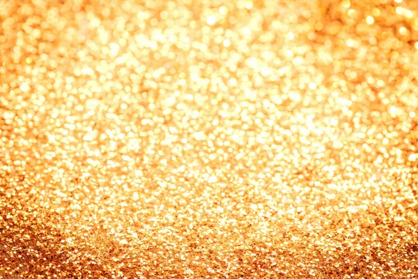 Goldene festliche Glitzerkonfetti Bokeh Hintergrund — Stockfoto