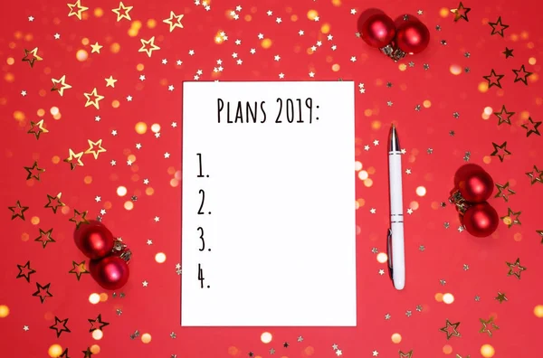 Notebook Pen Writing List Vibrant Red Background Decorated Christmas Baubles — Stock Photo, Image