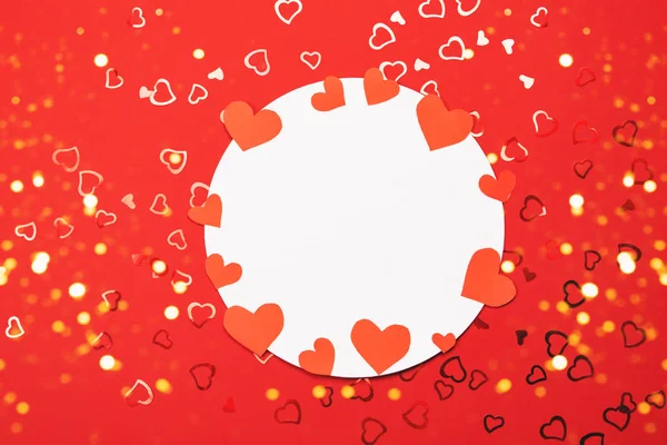 Festive background with heart-shaped confetti. — Stock Photo, Image