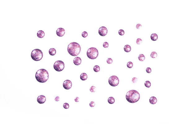 Purple glitter nail polish drops isolated on white. — Stock Photo, Image