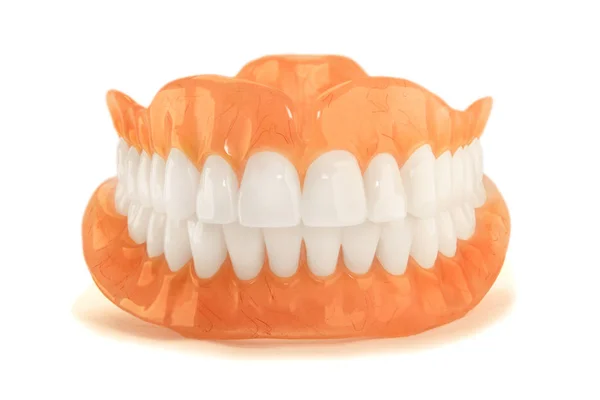 塑料义齿的特写关闭没有喜欢的背景 现代牙医新技术 — 图库照片