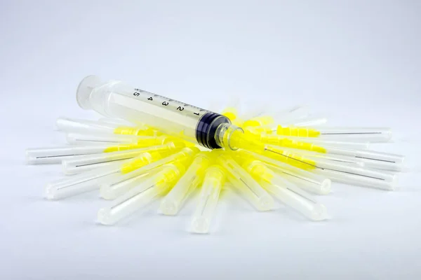 endodontic syringe for flushing the root canals of the tooth. Close-up of macro tools for dental treatment