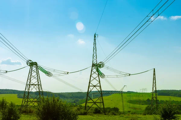 power line close up against the blue sky. Power industry