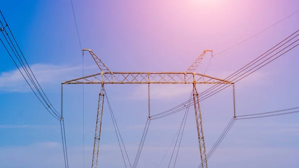 power line close up against the blue sky. Power industry