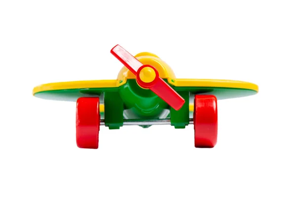 Pervane ve iniş takımları ile sarı oyuncak uçak izole bir — Stok fotoğraf