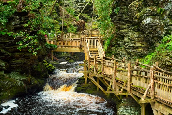 Wooden walkway along Little Bushkill Creek above the main falls at Bushkill Falls