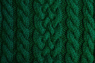 Doku sıcak örme yeşil kış giysi. Rahat giysiler el yapımı örgü arka plan