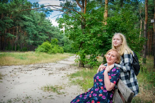 Summer Afternoon Grandmother Sits Bench Forest Her Granddaughter Hugs Her — Stock Photo, Image