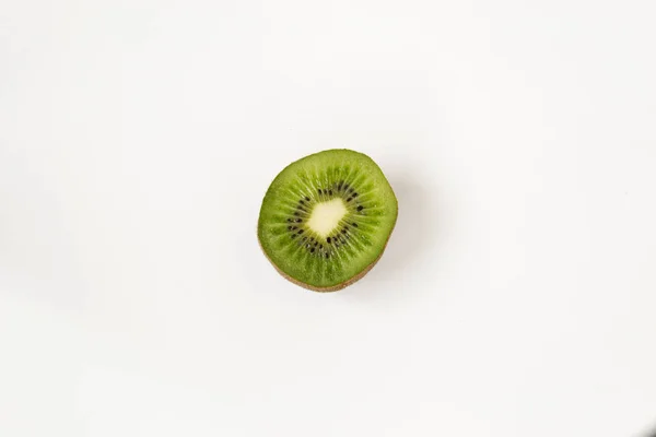 Slice of kiwi fruit isolated on white background — Stock Photo, Image