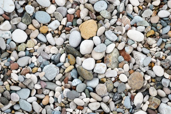 Die Textur der Steine, der Kiesstrand. — Stockfoto