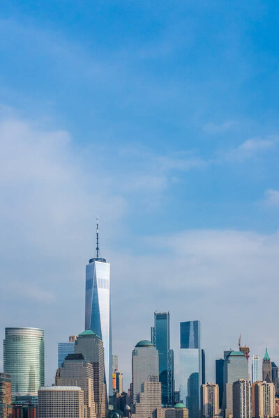 Skyline of Downtown Manhattan against Blue Sky