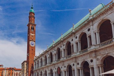 Palladian Basilica and clock tower in in the central Piazza dei Signori of Vicenza, italy clipart