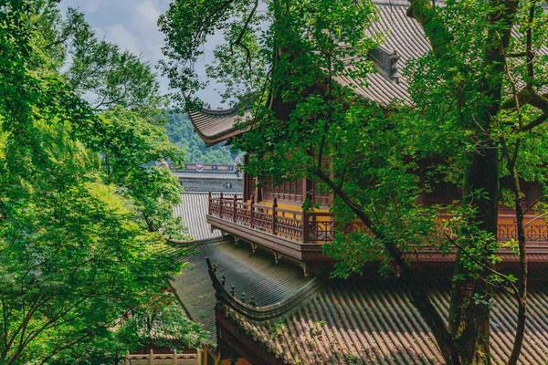 Traditional Chinese architecture among bamboos and trees, in Lingyin Temple, in Hangzhou, China