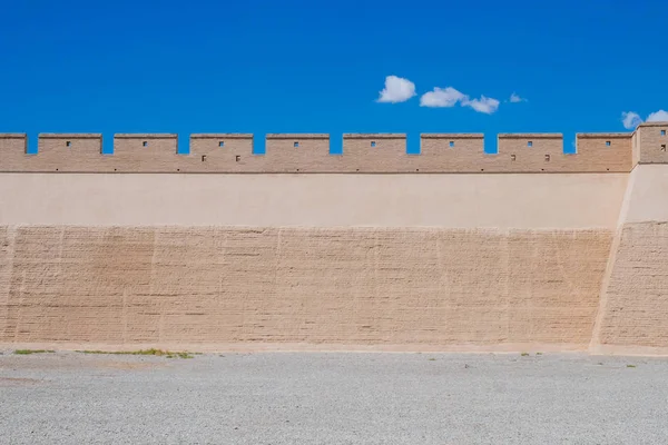 Fortress wall under blue sky at Jiayu Pass, first frontier fortress at the west end of the Ming dynasty Great Wall of China, in Jiayuguan, China