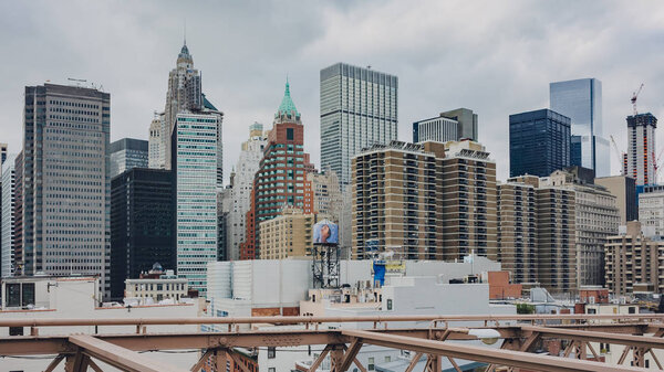 New York City, USA - Jan. 2, 2016: View of buildings of lower Manhattan from Brooklyn Bridge