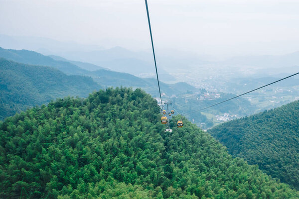 Cable cars traveling on Wugong Mountain in Jiangxi, China